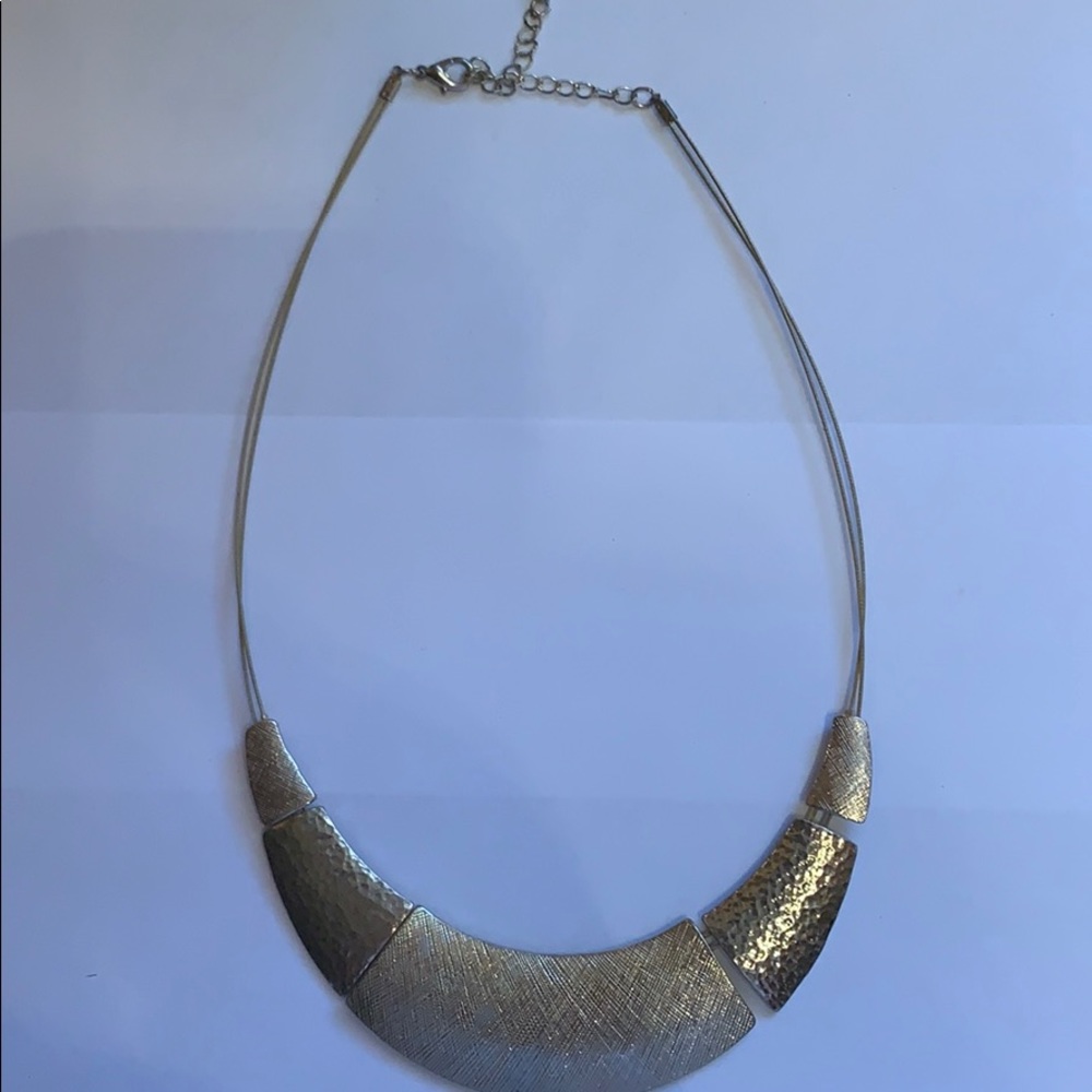 Silver toned choker.